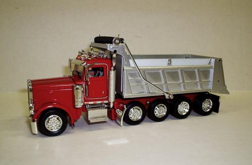 Peterbilt 388 5 axle Dump Truck in Red with Silver bed   